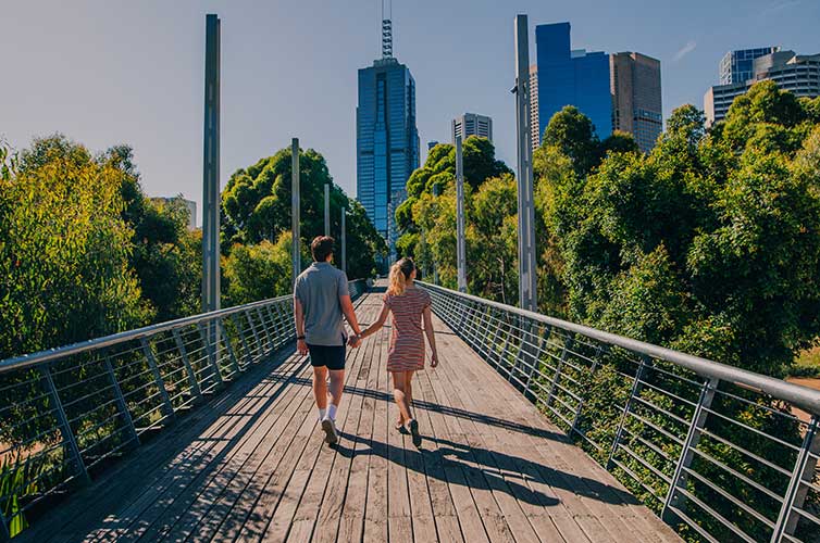 couple walking park visit australia