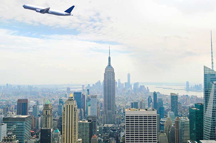 plane-nyc-skyline-flight