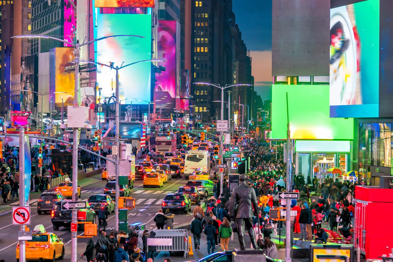 Times Square area with neon art and commerce, Manhattan, New York City, United States.