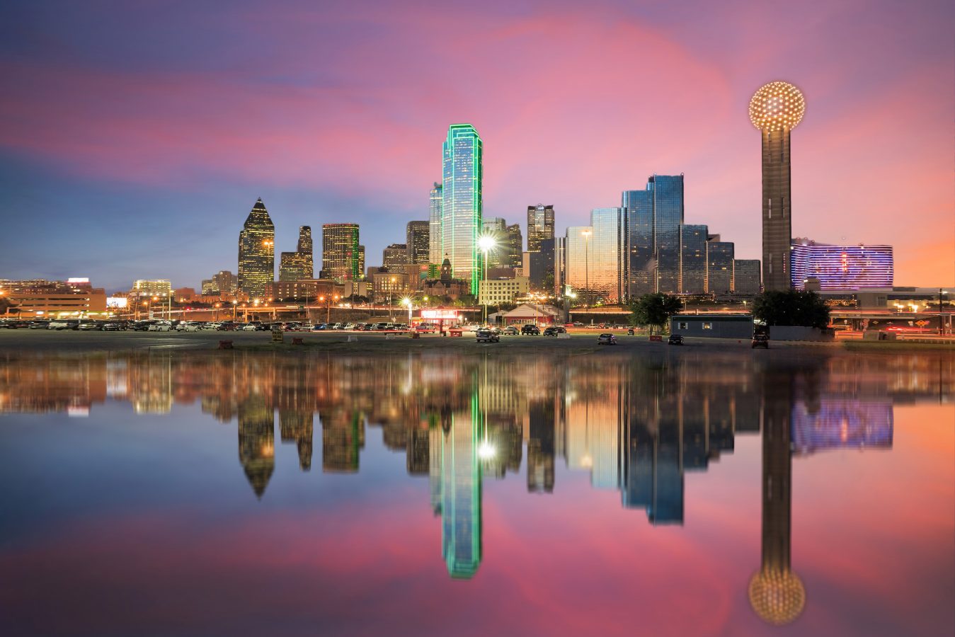 One of the cheapest destinations for 2023, Dallas skyline reflected in Trinity river at sunset, Texas.