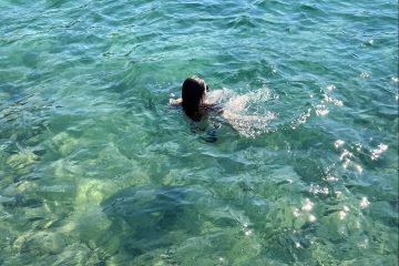 Girl swimming Aegean Sea, Bodrum, Turkey