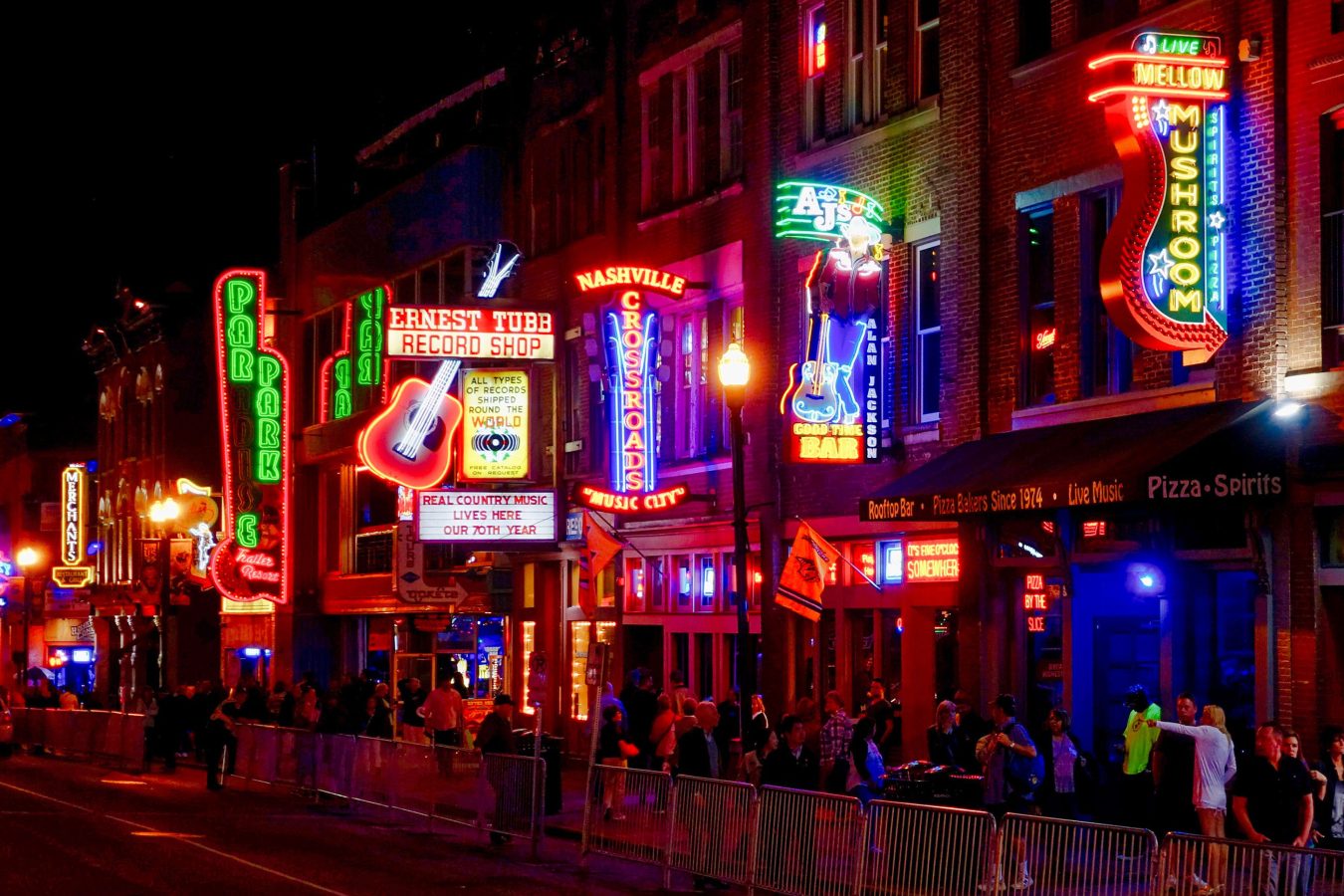 Lit up street in Nashville, Tennessee at night.
