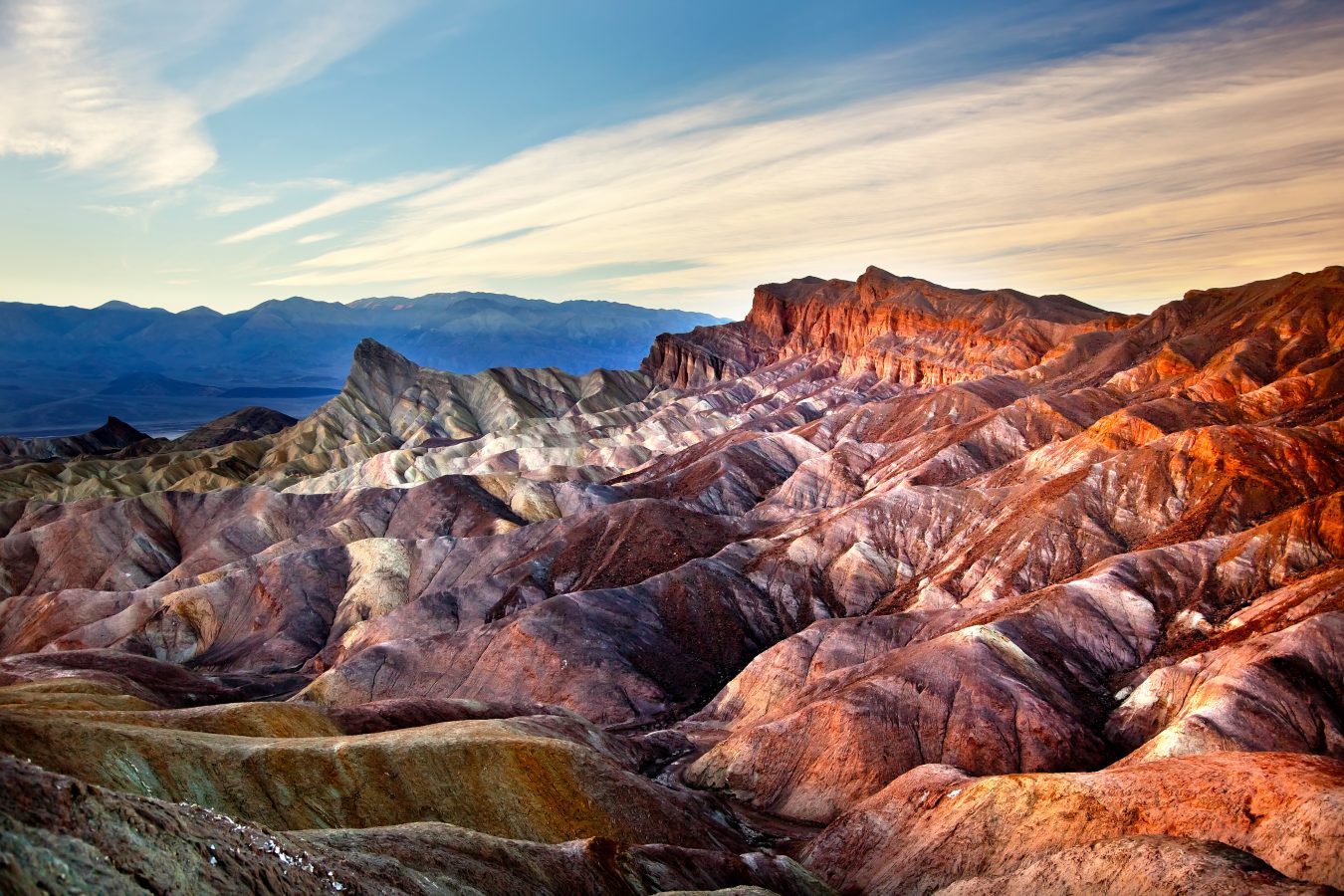 Zabriski Point Manly Beacon Mudstones form Badlands  Death Valley National Park California