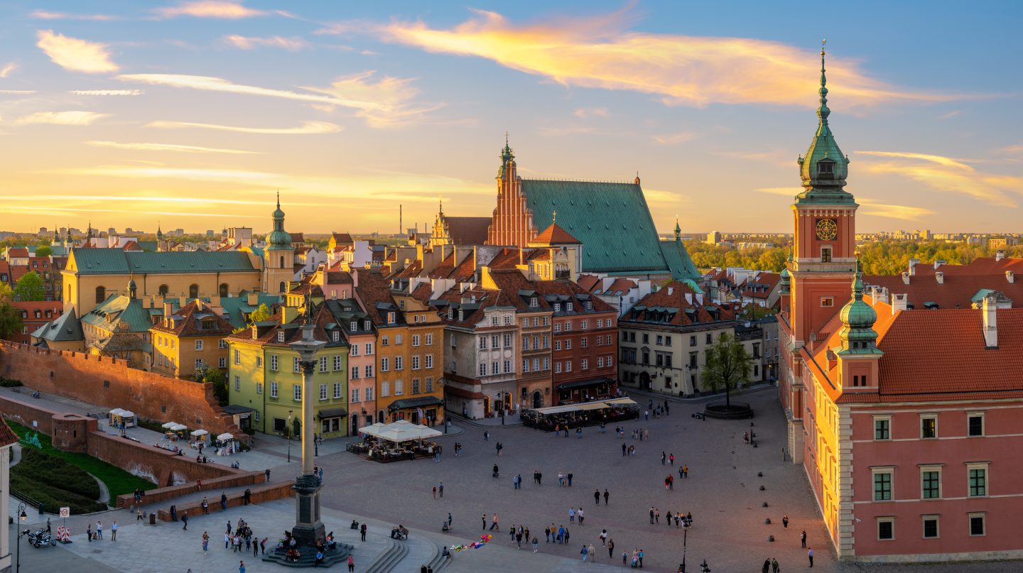 Royal castle and old town at sunset in Warsaw, Poland. Eastern Europe is an affordable student travel destination from India.