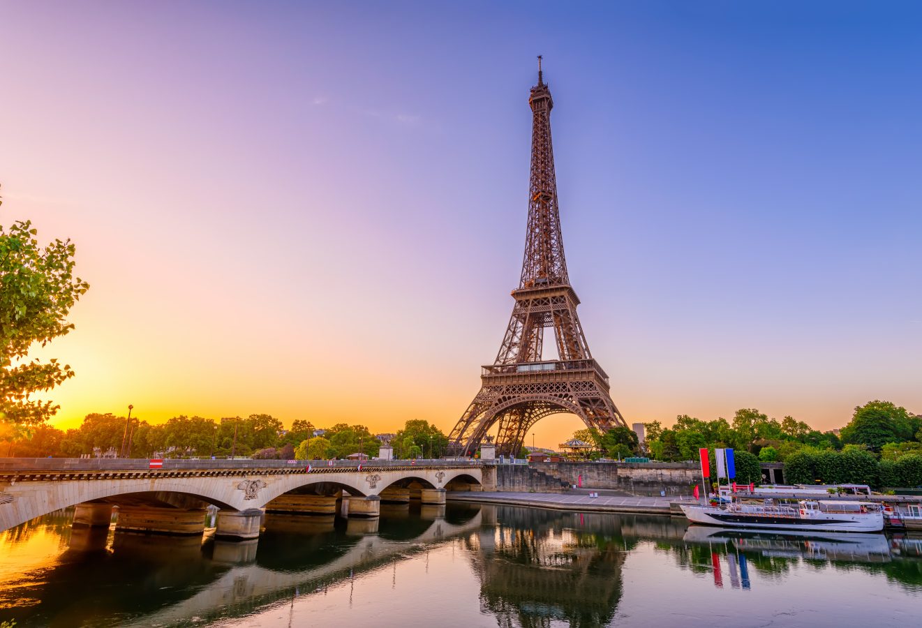 View of Eiffel Tower and river Seine at sunrise in Paris, France